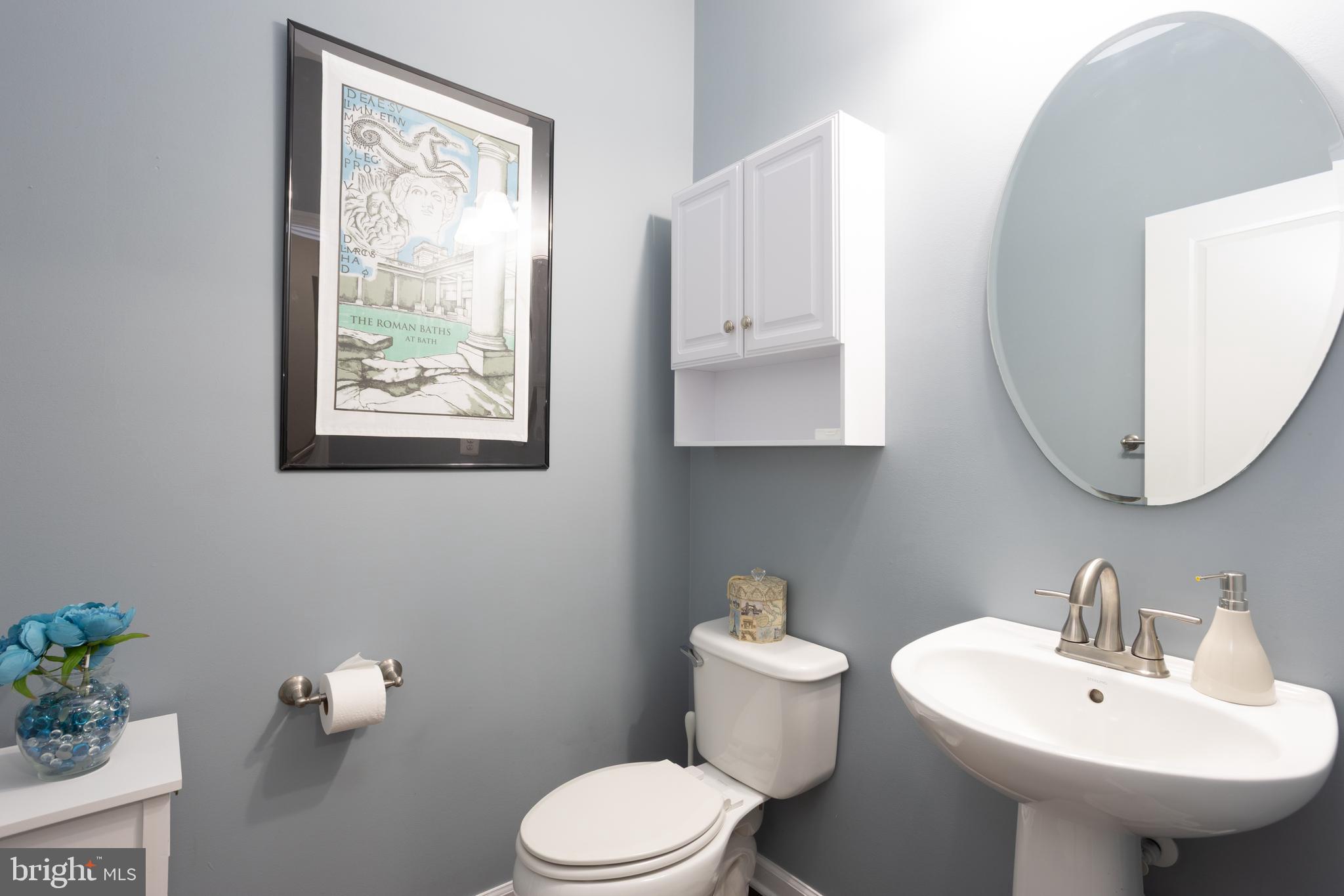 153 Cool Springs Road North East, MD 21901 - Photo 15 of 47 a bathroom with a toilet sink and mirror