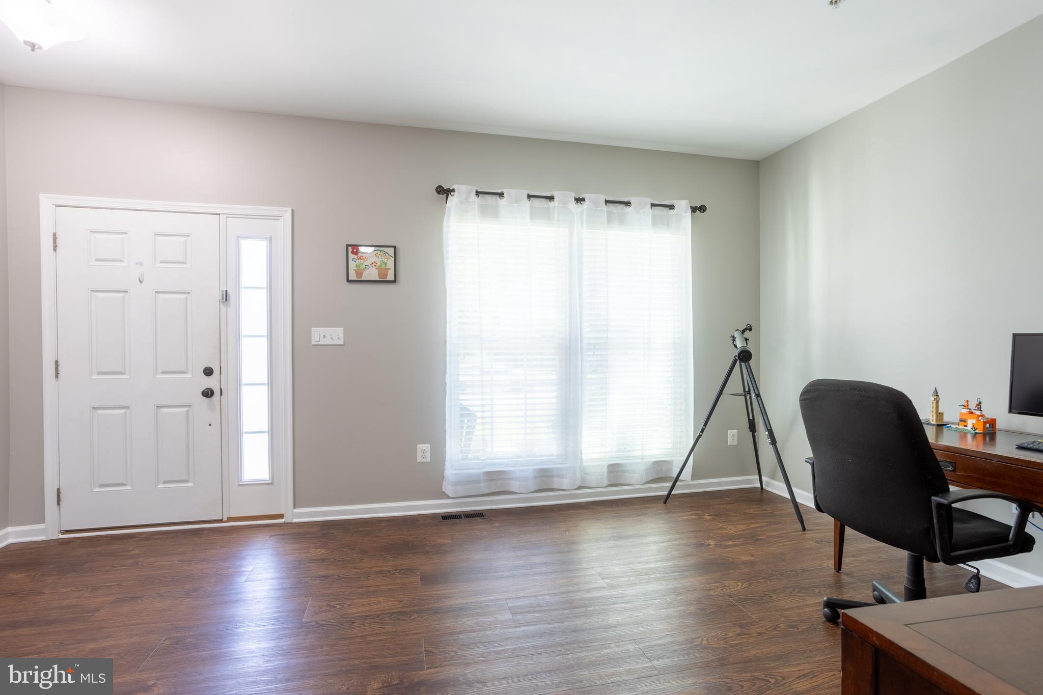 153 Cool Springs Road North East, MD 21901 - Photo 16 of 47 a view of a workspace with furniture and a window