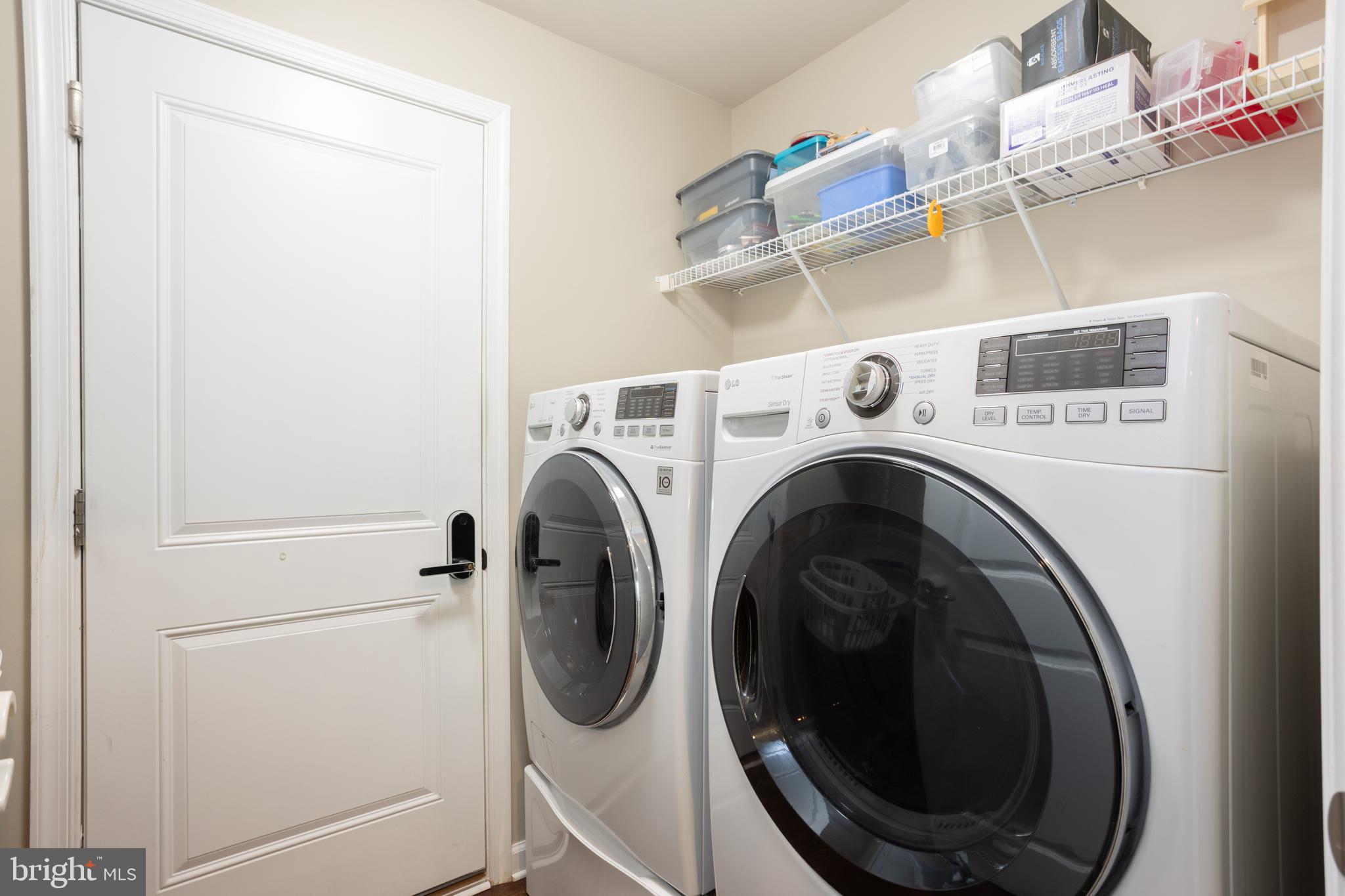 153 Cool Springs Road North East, MD 21901 - Photo 19 of 47 a utility room with dryer and washer