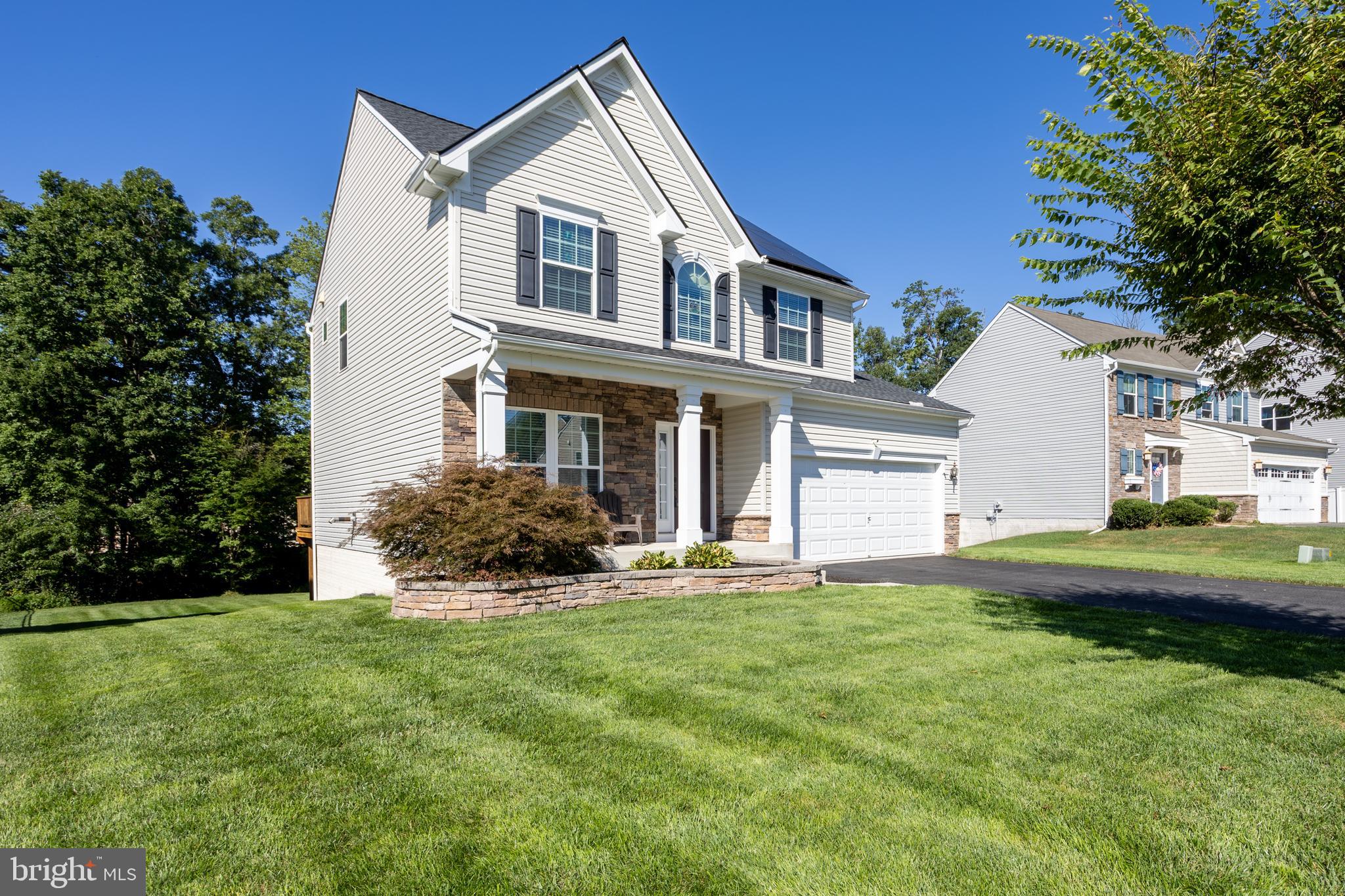 153 Cool Springs Road North East, MD 21901 - Photo 2 of 47 a front view of a house with a yard