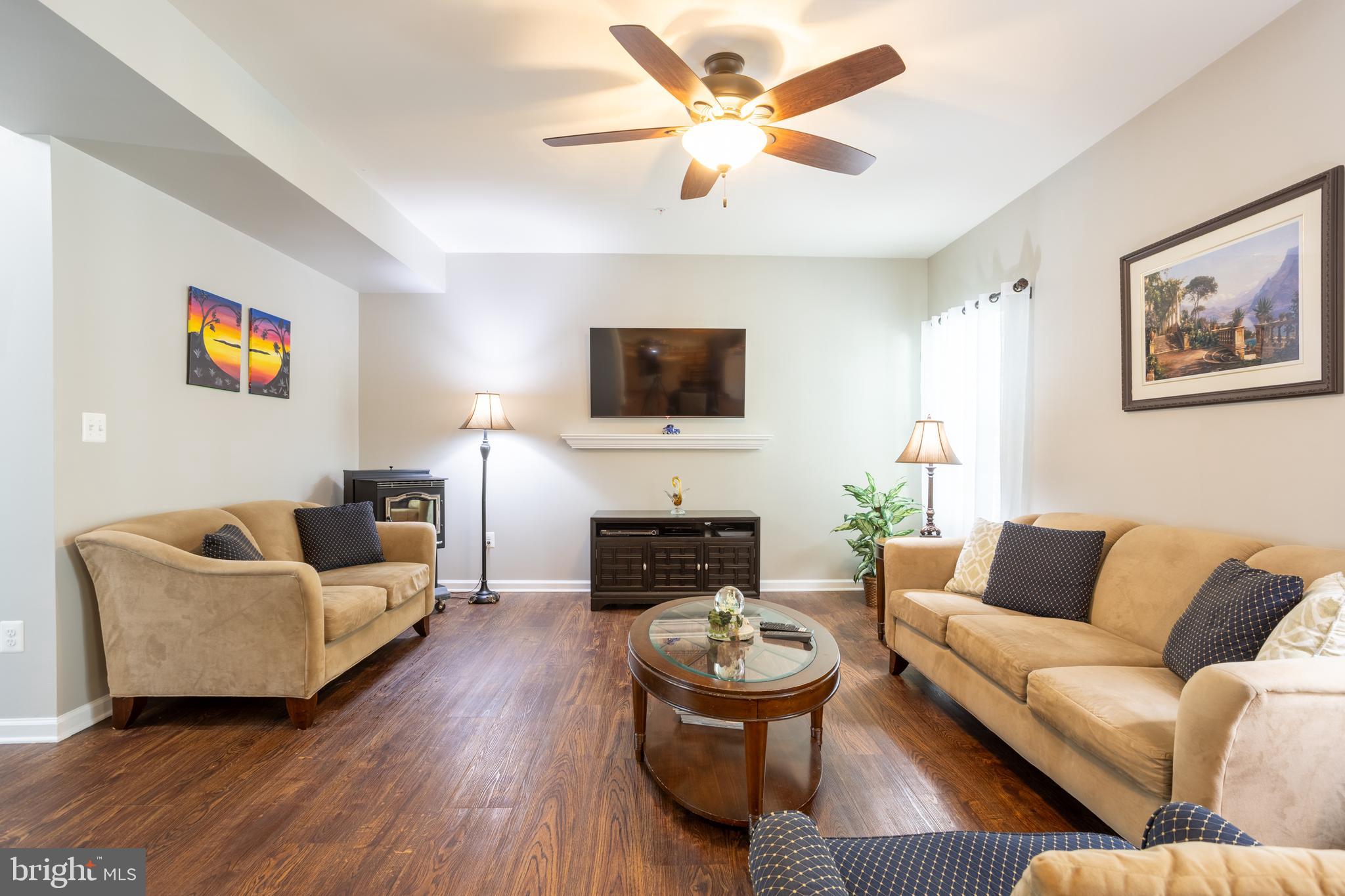 153 Cool Springs Road North East, MD 21901 - Photo 26 of 47 a living room with furniture and a fireplace