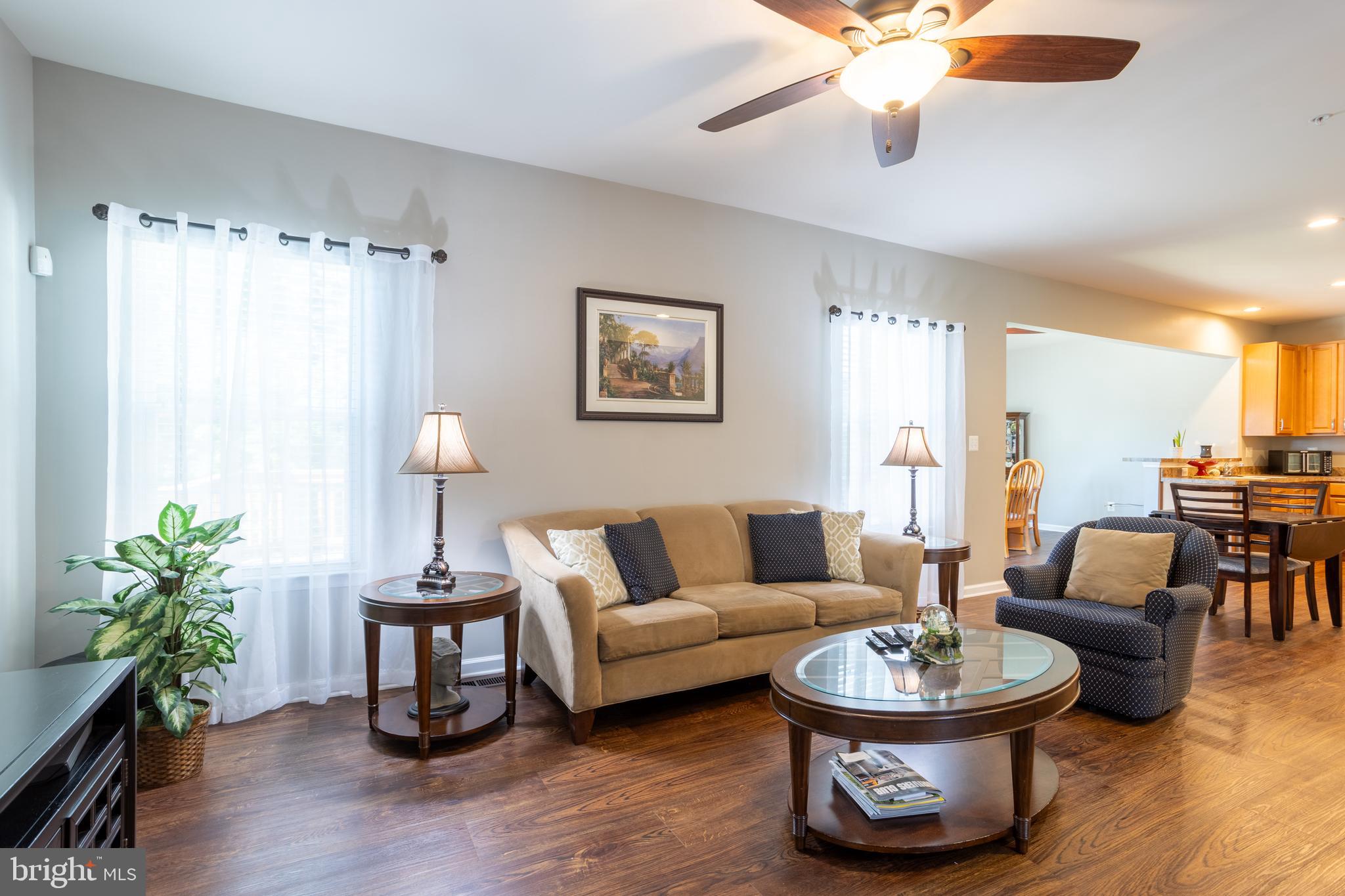 153 Cool Springs Road North East, MD 21901 - Photo 29 of 47 a living room with furniture and a wooden floor