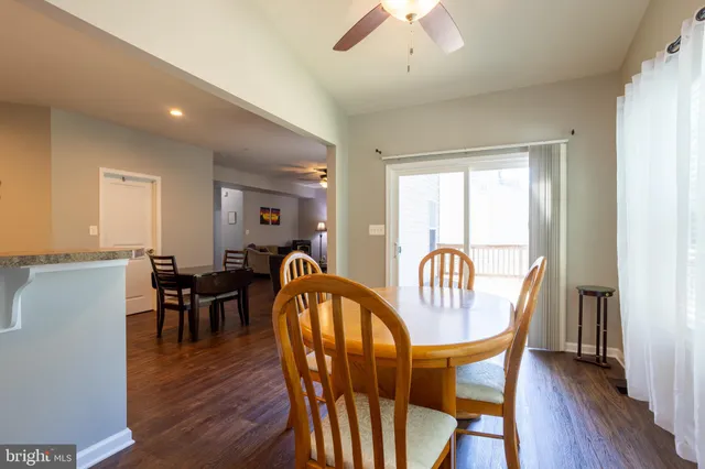 a dining room with furniture window wooden floor