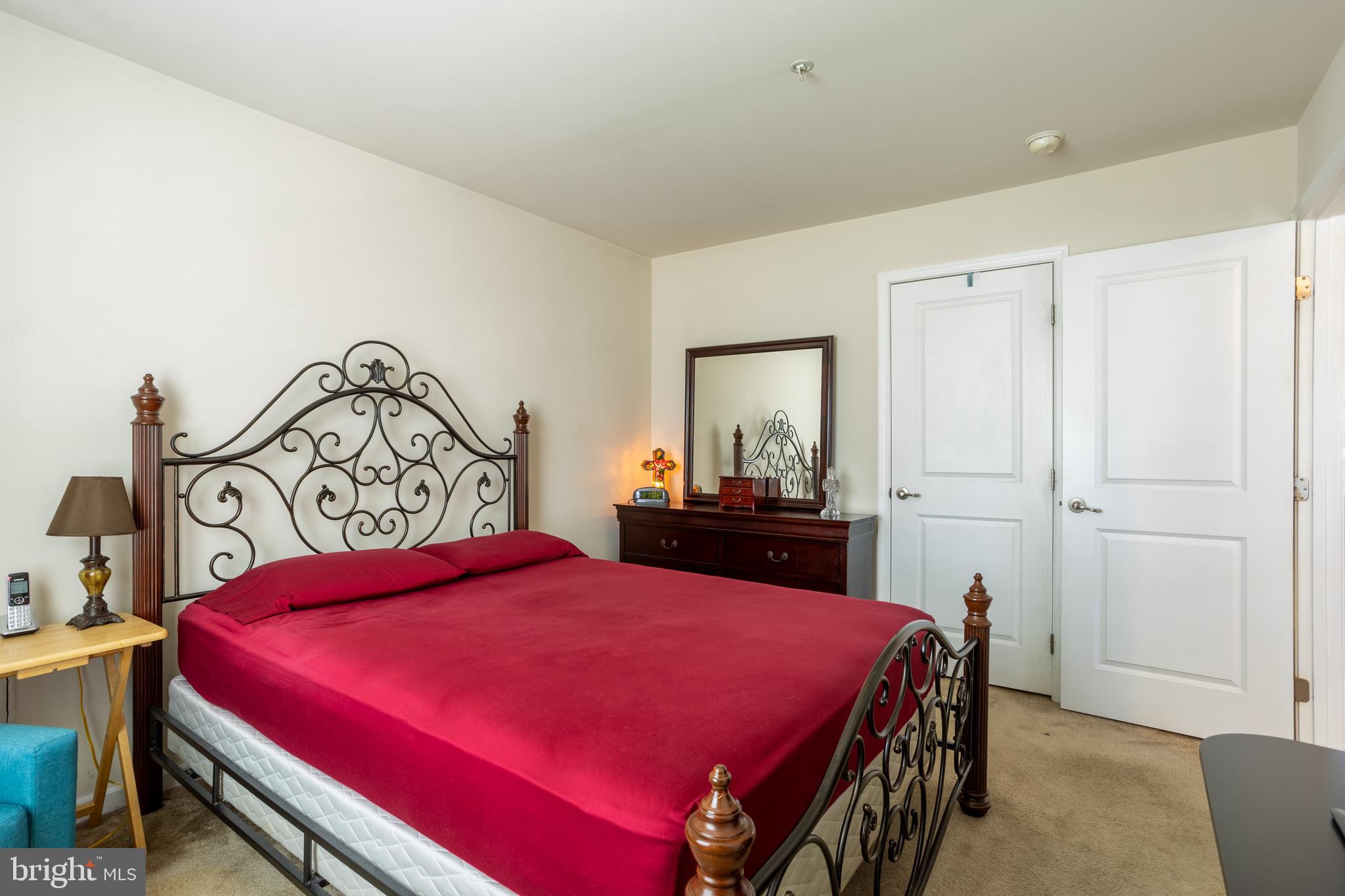 153 Cool Springs Road North East, MD 21901 - Photo 40 of 47 a bedroom with a bed and a dresser