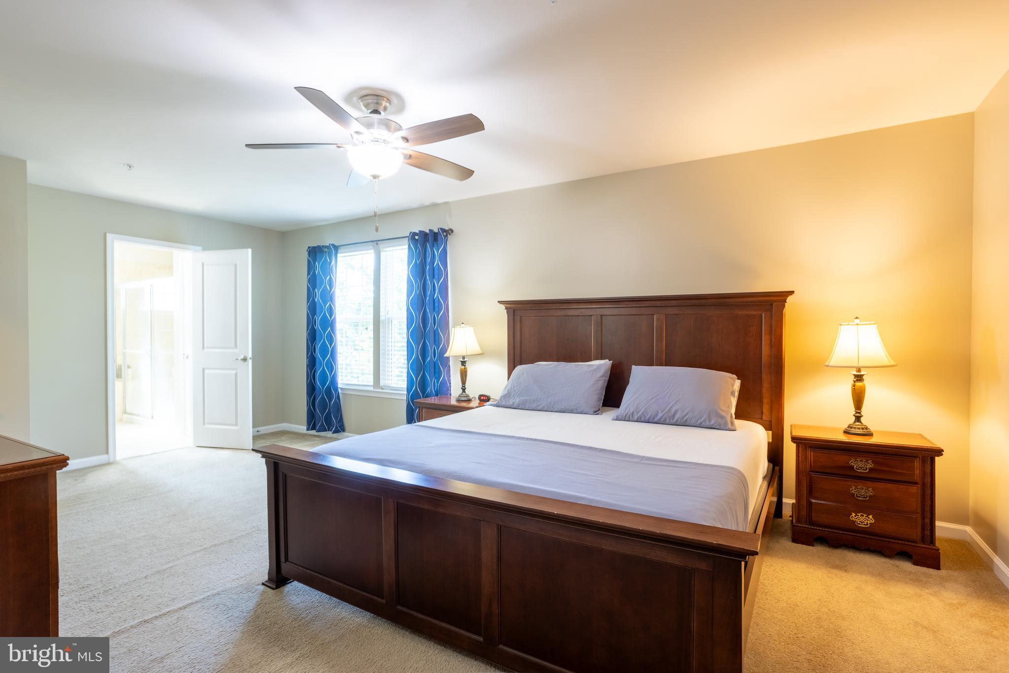 153 Cool Springs Road North East, MD 21901 - Photo 41 of 47 a bedroom with a bed and wooden floor