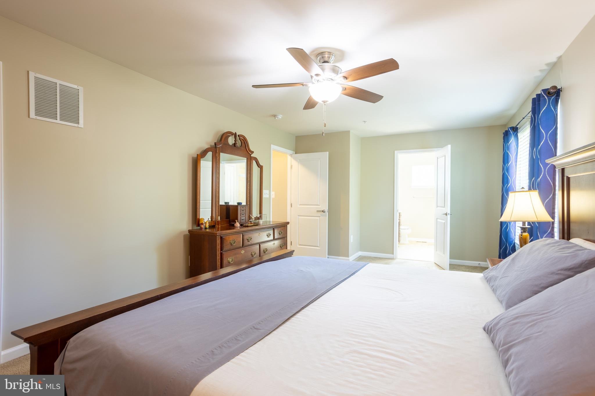 153 Cool Springs Road North East, MD 21901 - Photo 42 of 47 a bedroom with a bed and a chandelier