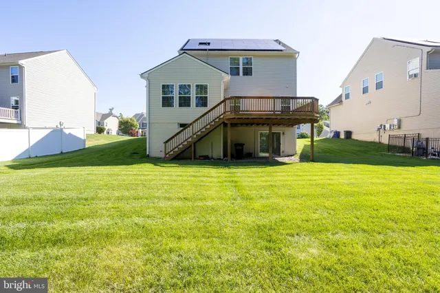 a view of a house with a swimming pool