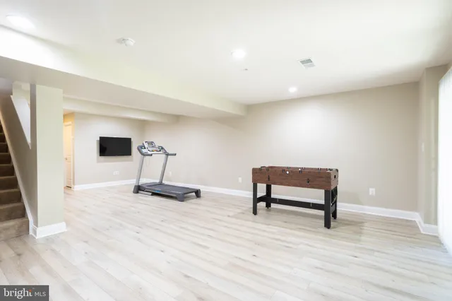 a view of a room with a bench