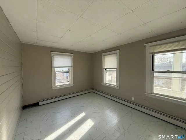 an empty room with windows
