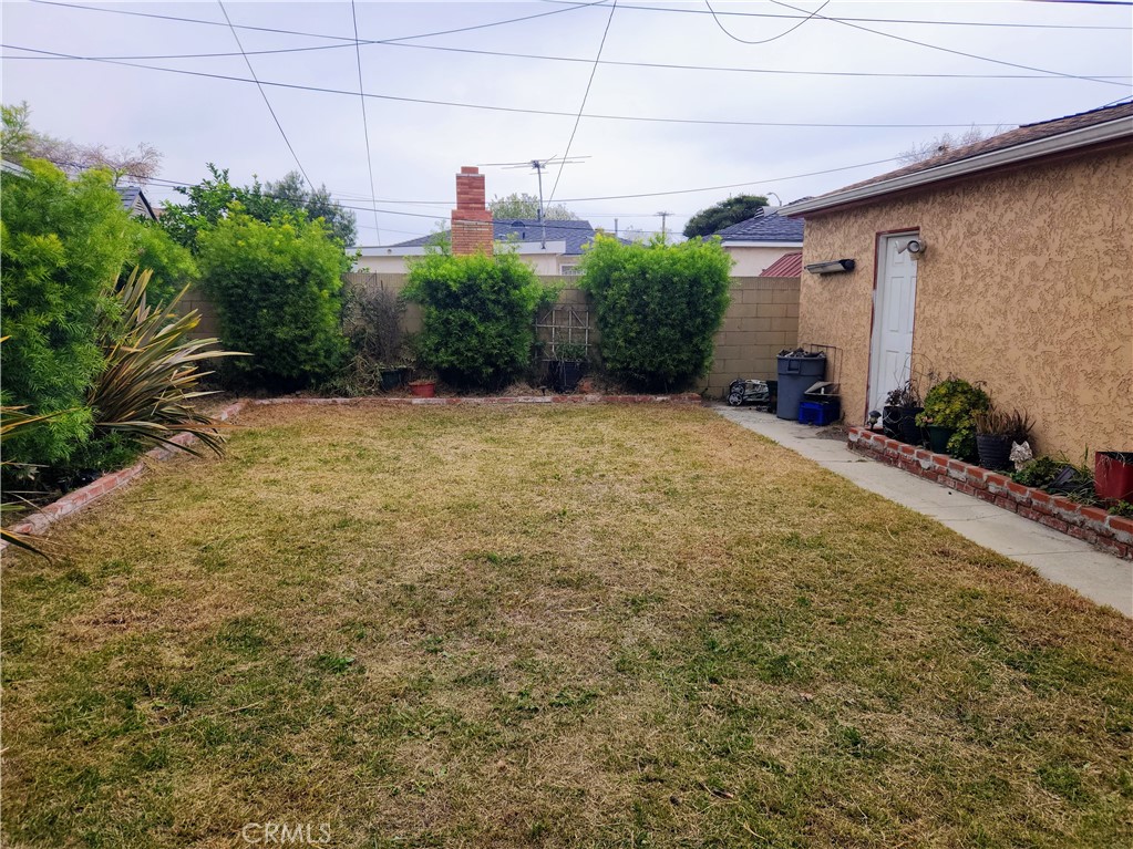 1325 West 34th Street Long Beach, CA 90810 - Photo 26 of 35 a house with a yard