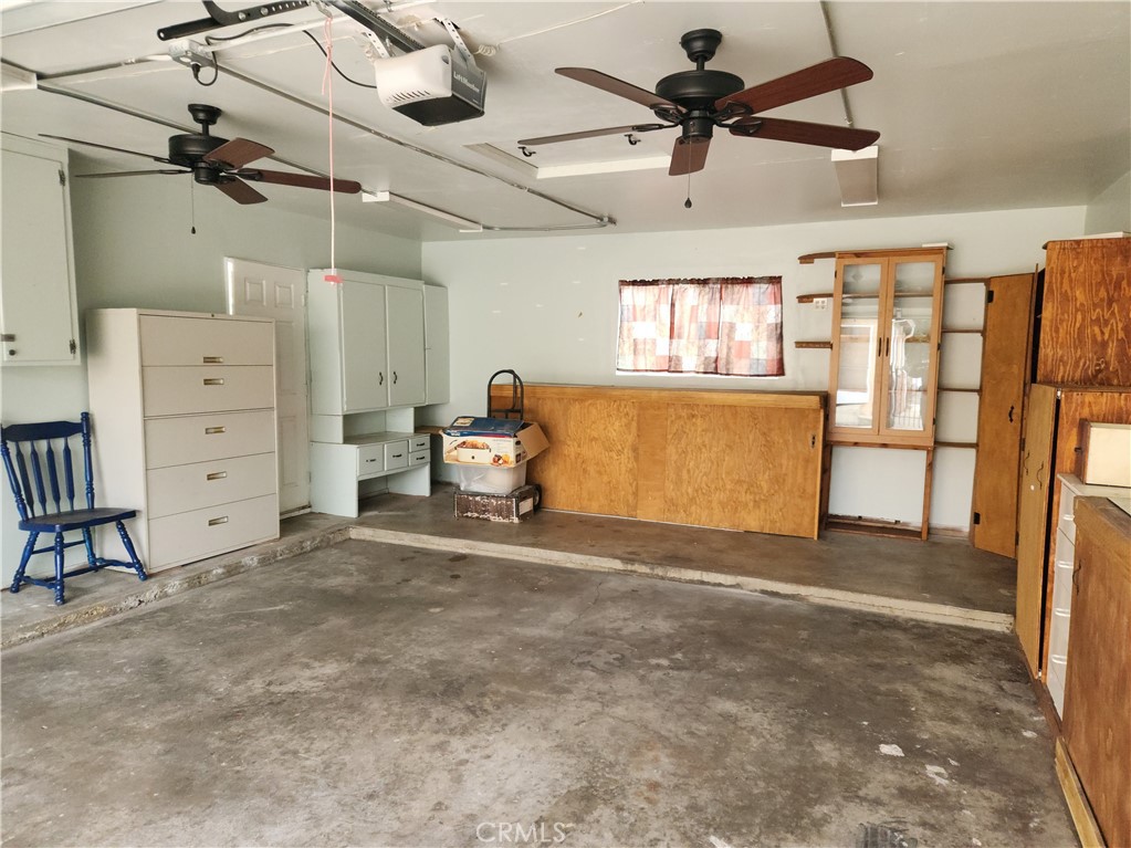1325 West 34th Street Long Beach, CA 90810 - Photo 30 of 35 a view of a livingroom with furniture and a ceiling fan