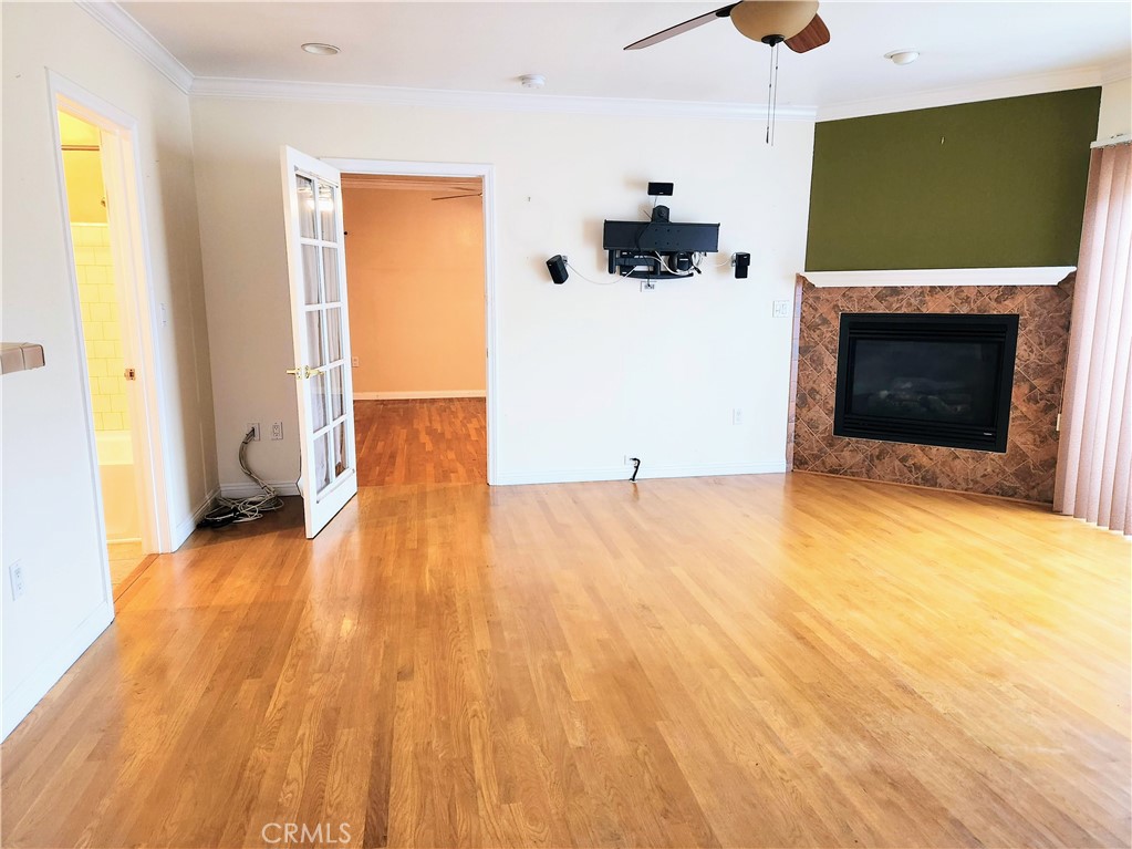 1325 West 34th Street Long Beach, CA 90810 - Photo 7 of 35 a view of empty room with a flat screen tv
