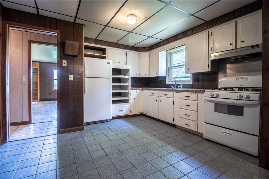106 Robinson Hill Road Sebago, ME 04029 - Photo 15 of 34 Tiled dining area, kitchen