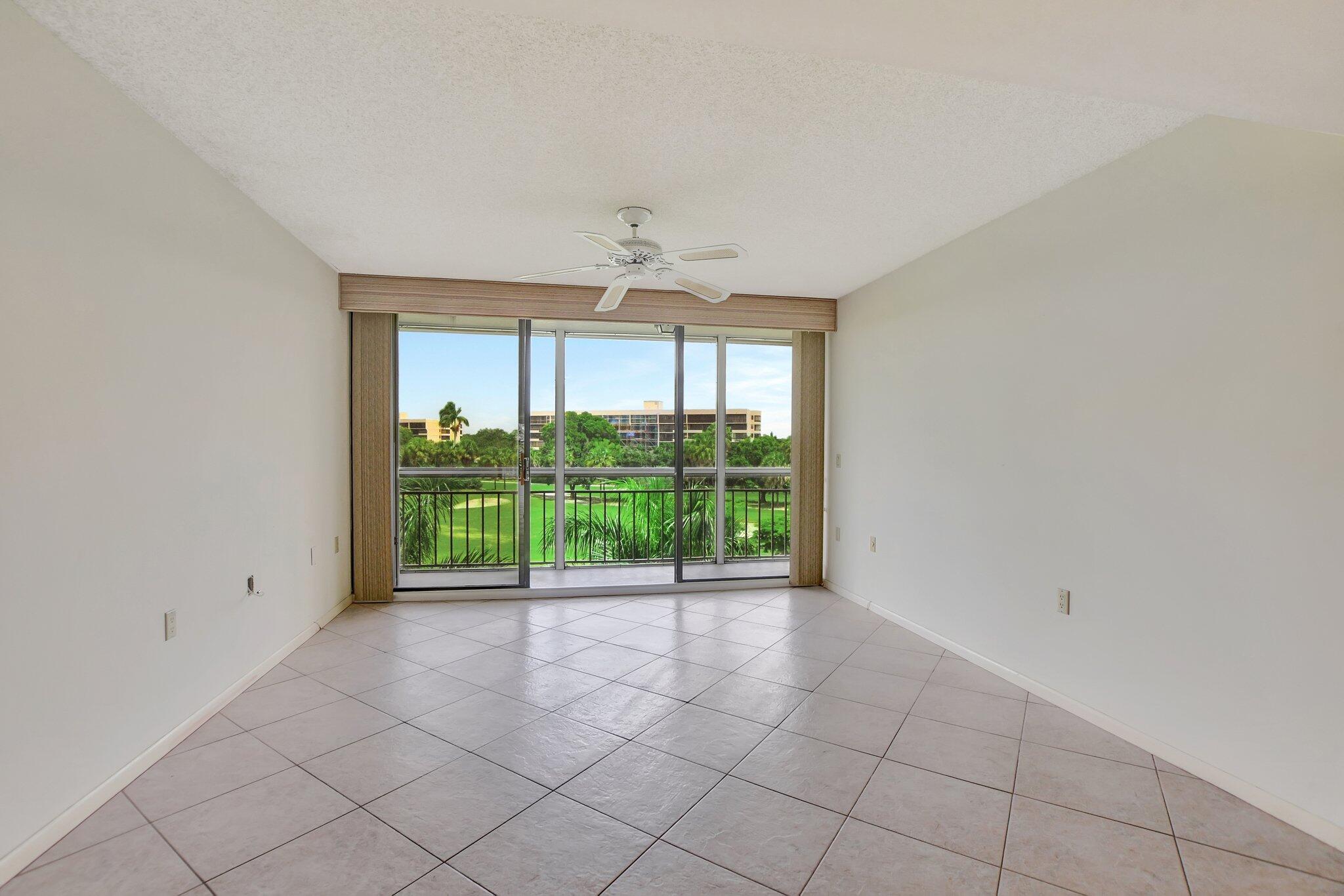 6145 Balboa Circle, Unit 405 Boca Raton, FL 33433 - Photo 17 of 25 Primary Suite & Screened Balcony