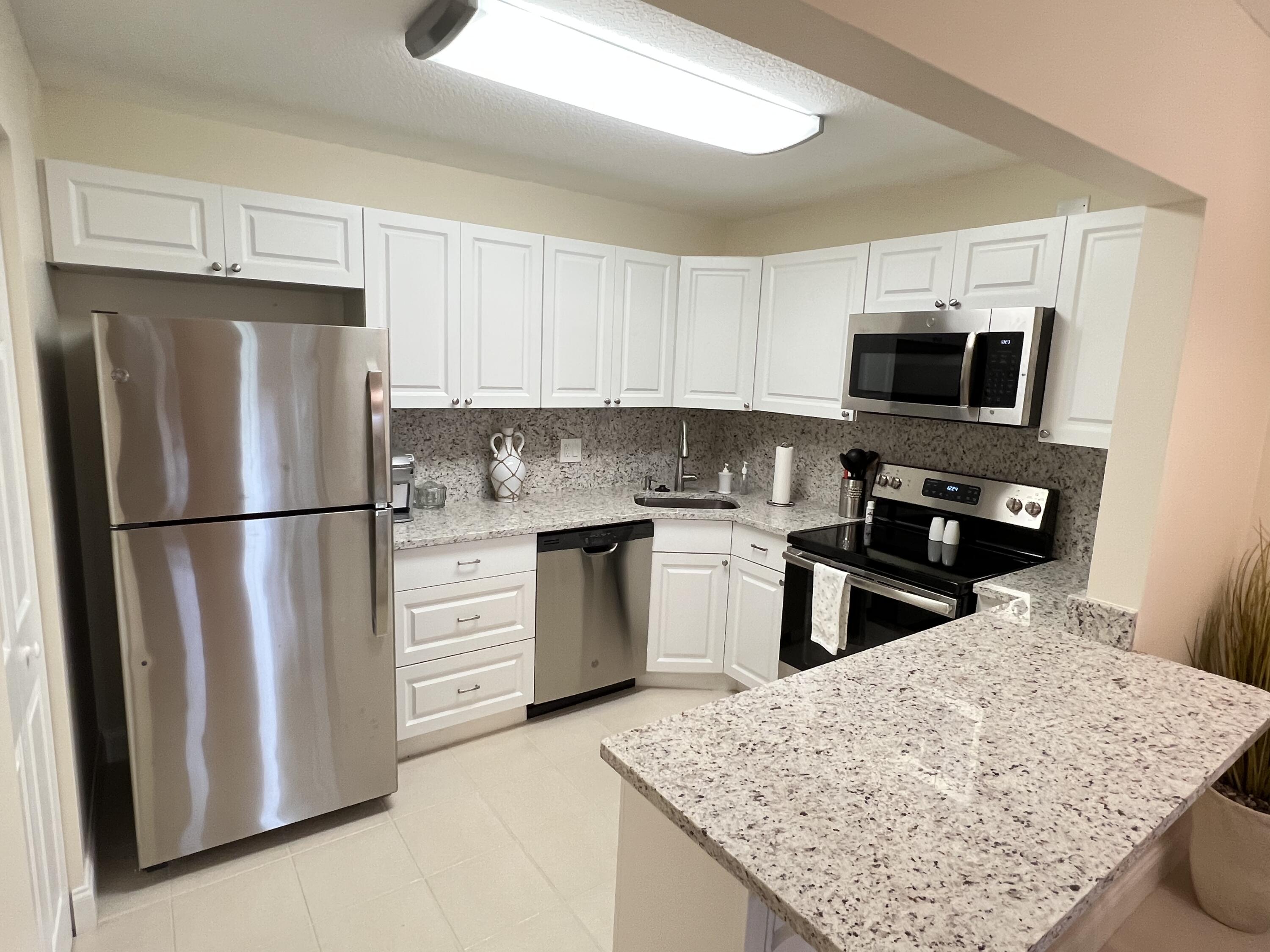 337 Knotty Pine Circle, Unit C2 Greenacres, FL 33463 - Photo 5 of 33 0810233D-A584-4202-B02E-D3BA9AA952C4