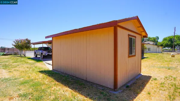 a house view with a garden space