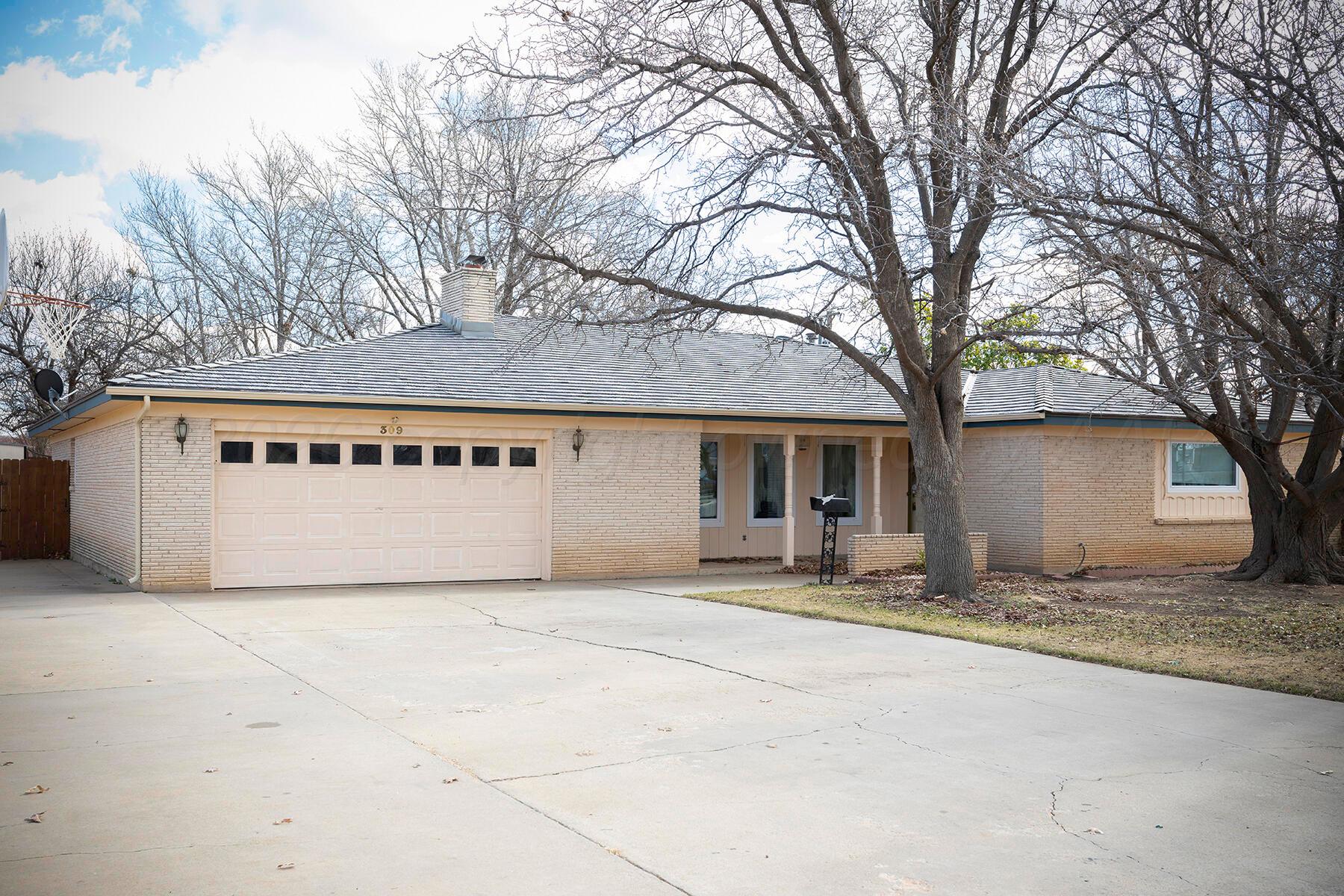 309 Bennett Drive Dumas, TX 79029 - Photo 2 of 35 Front