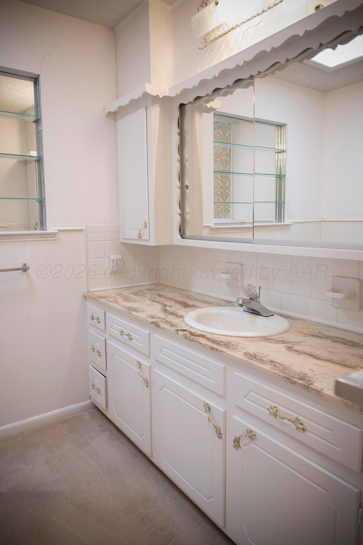 309 Bennett Drive Dumas, TX 79029 - Photo 24 of 35 Bathroom 2