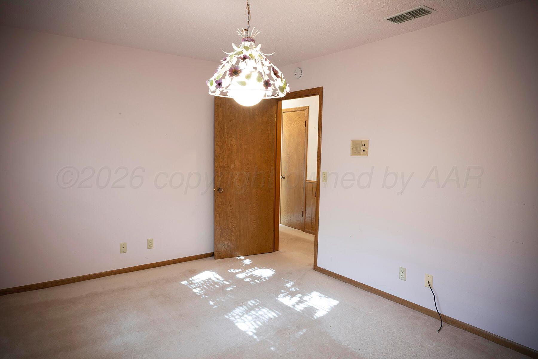 309 Bennett Drive Dumas, TX 79029 - Photo 26 of 35 Bedroom 2