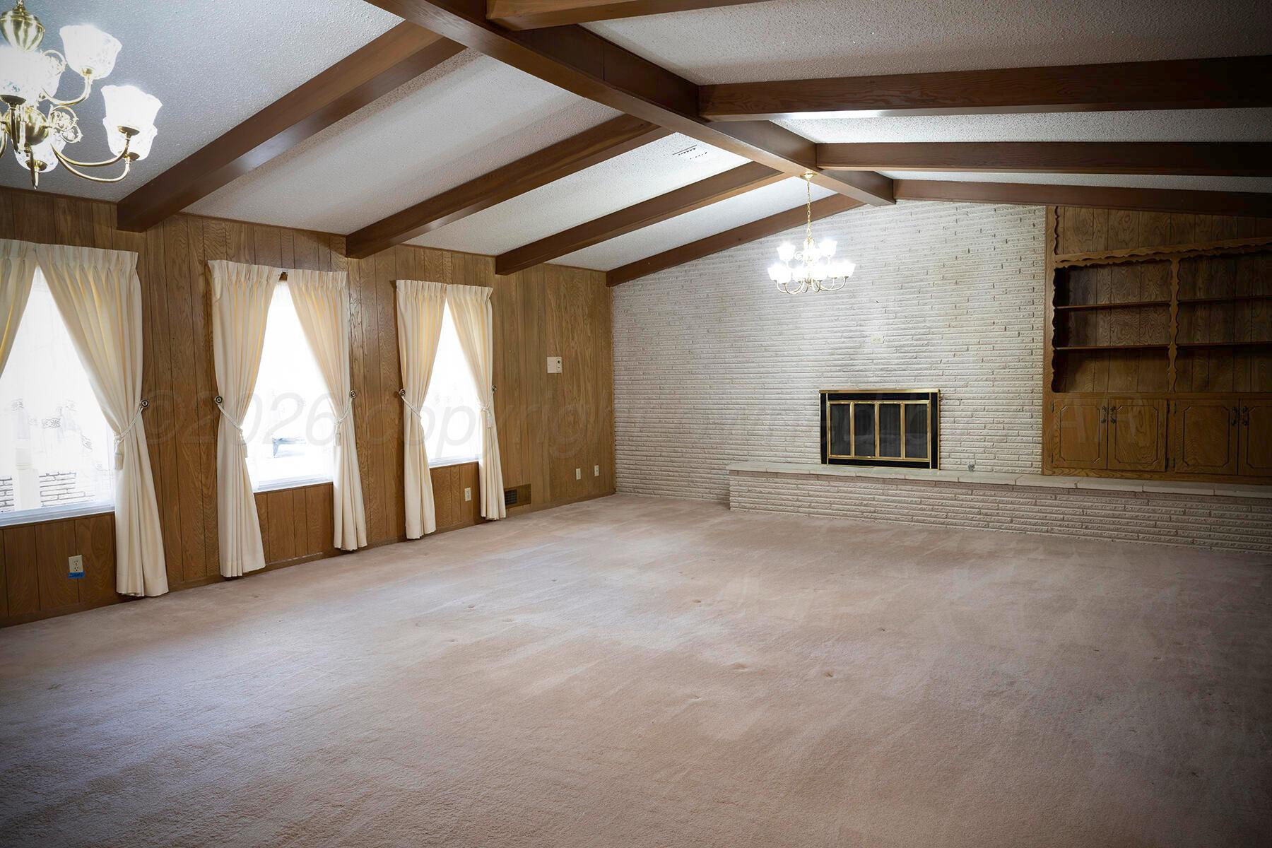 309 Bennett Drive Dumas, TX 79029 - Photo 6 of 35 Living room 1
