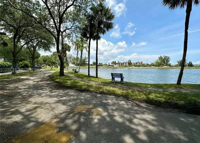 a view of a lake with a big yard
