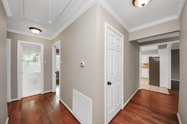 a bathroom with a sink a mirror and a toilet