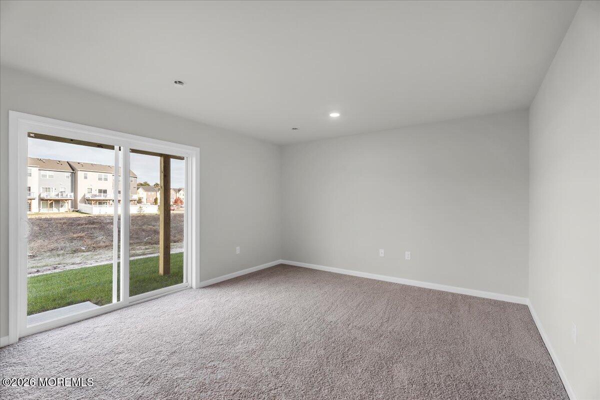 216 Sandy Rdg Road Sicklerville, NJ 08081 - Photo 12 of 24 a view of an empty room with glass door