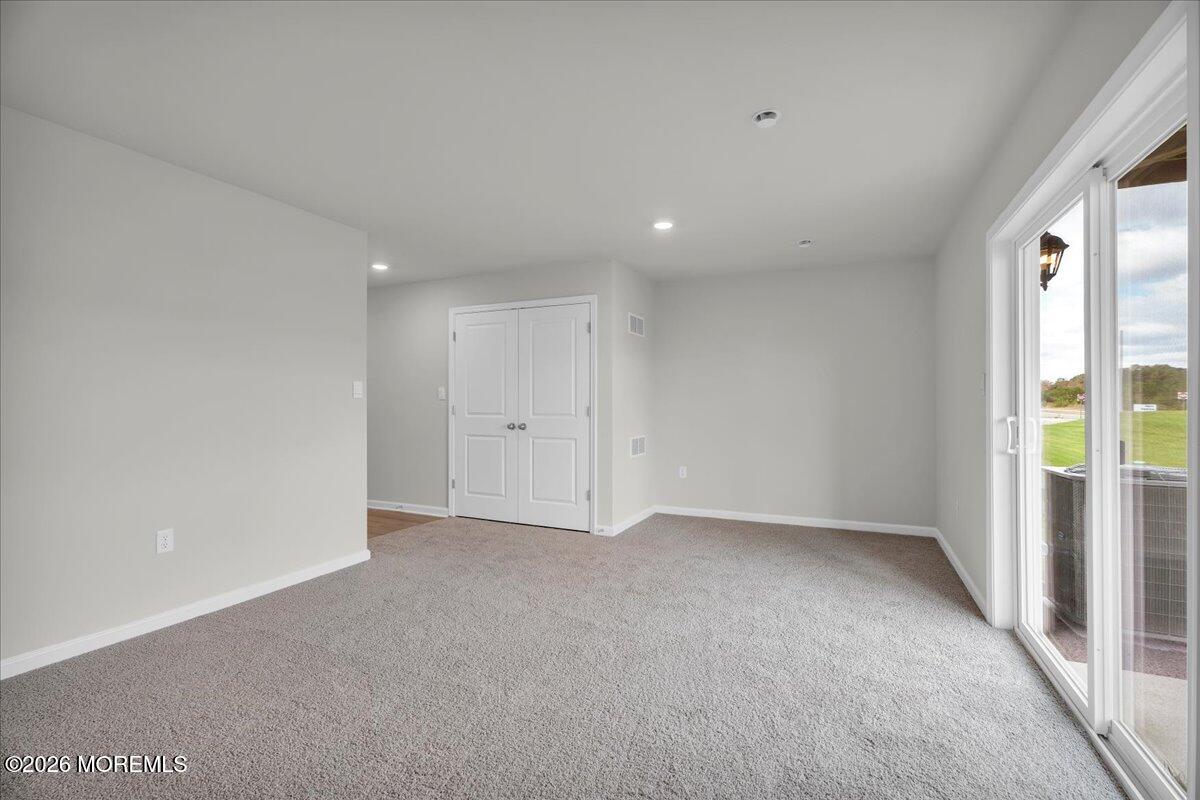 216 Sandy Rdg Road Sicklerville, NJ 08081 - Photo 15 of 24 an empty room with windows