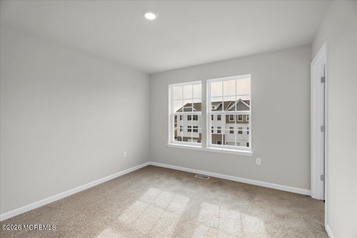 216 Sandy Rdg Road Sicklerville, NJ 08081 - Photo 16 of 24 an empty room with a window