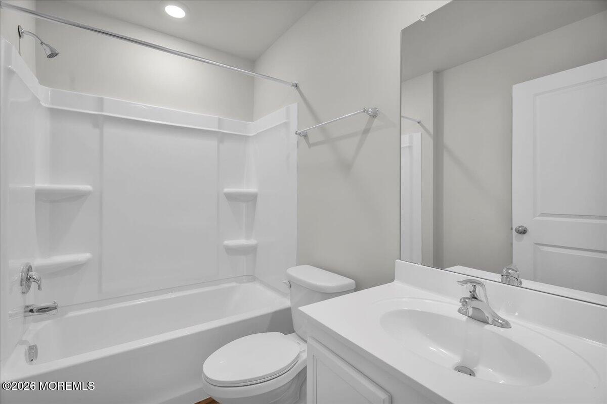 216 Sandy Rdg Road Sicklerville, NJ 08081 - Photo 19 of 24 a bathroom with a bathtub shower sink vanity mirror and toilet