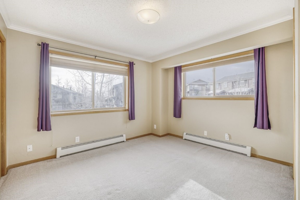 63 20 Grand Court, Unit 63 Silverthorne, CO 80498 - Photo 15 of 28 a view of an empty room with a window