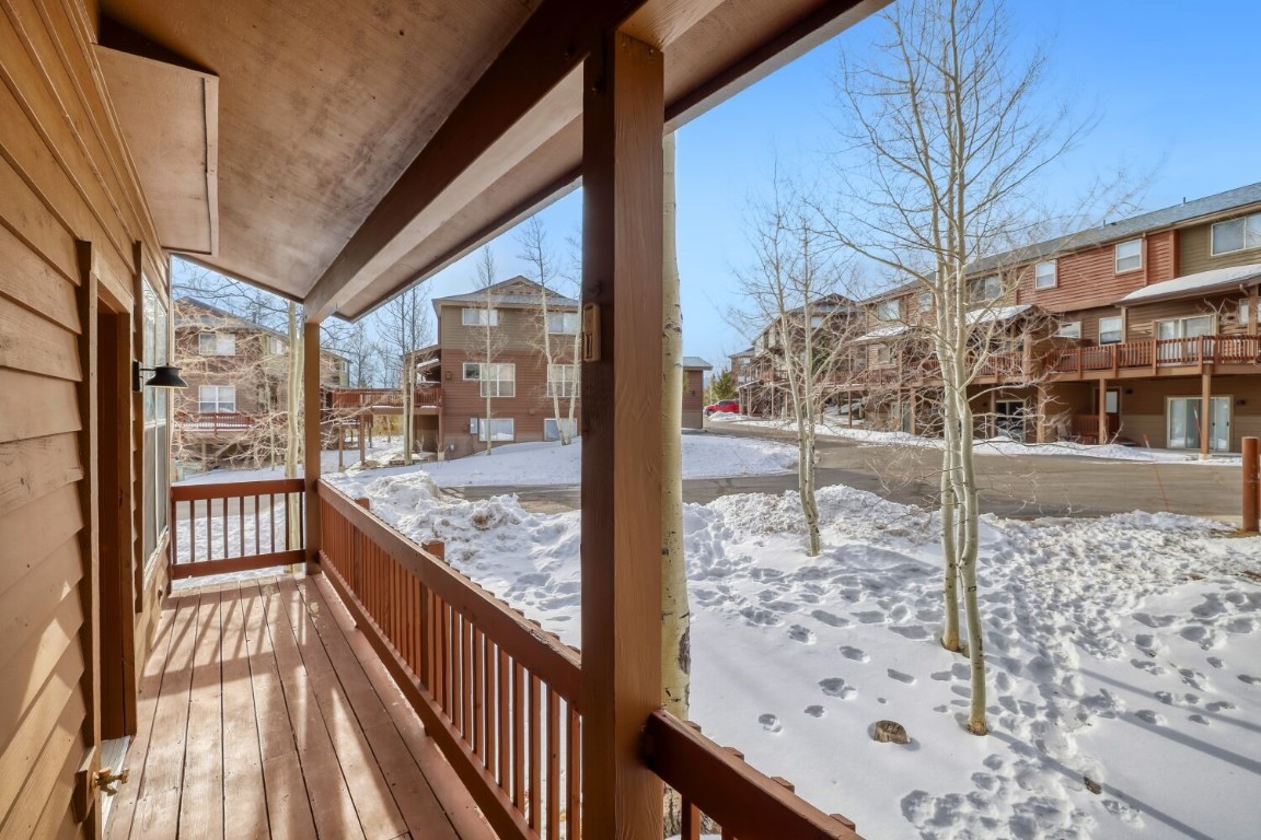 63 20 Grand Court, Unit 63 Silverthorne, CO 80498 - Photo 19 of 28 a view of a porch with a bench