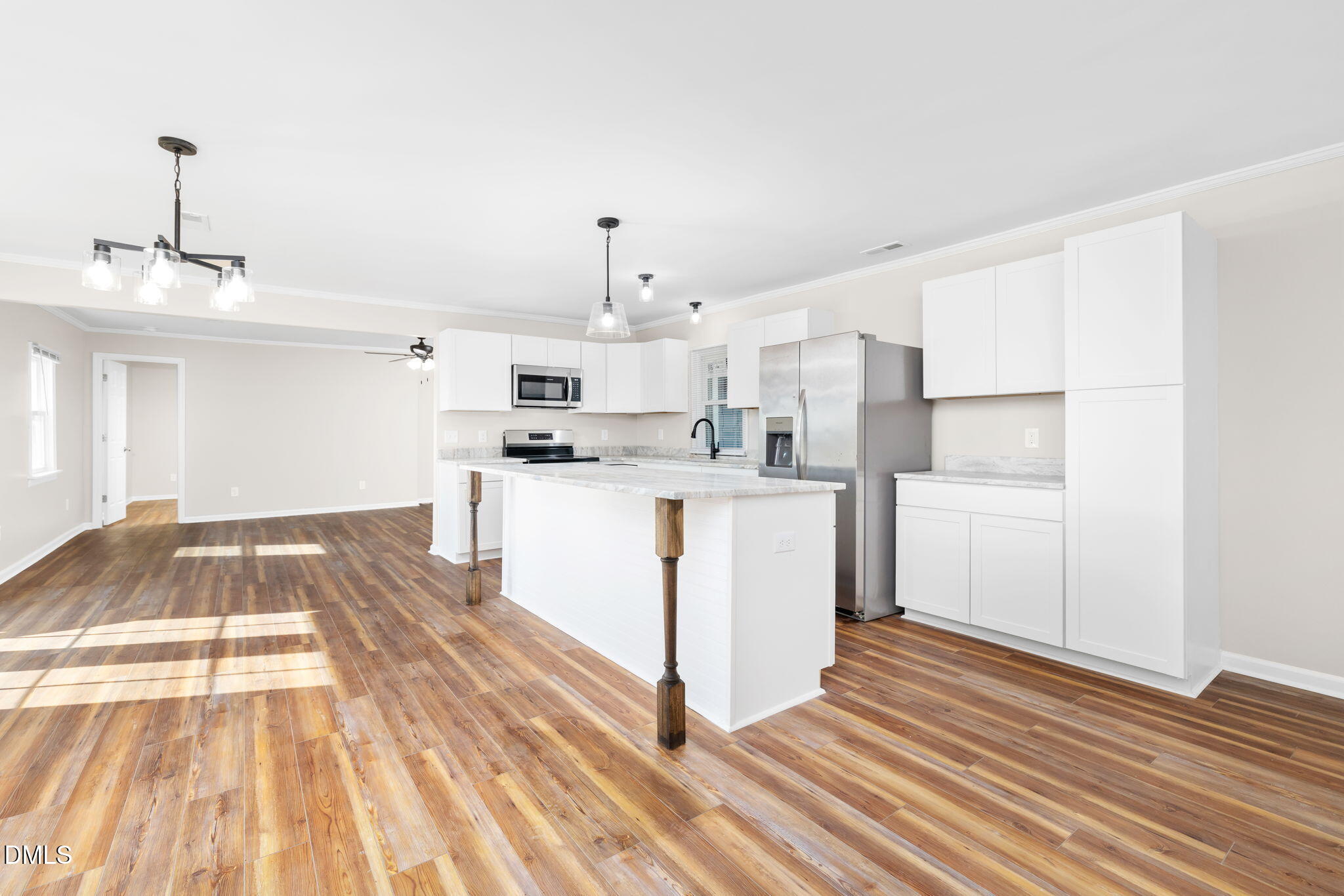 426 Rooker Dairy Road Norlina, NC 27563 - Photo 8 of 33 a view of kitchen with wooden floor and electronic appliances