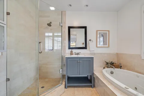 a bathroom with a sink and a window