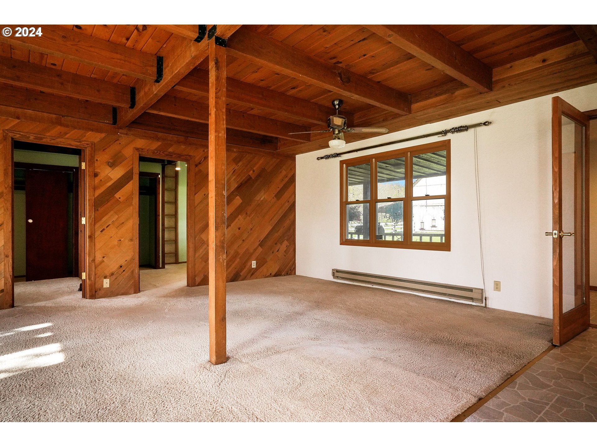 10342 Liberty Road South Jefferson, OR 97352 - Photo 10 of 40 a view of an empty room with a window