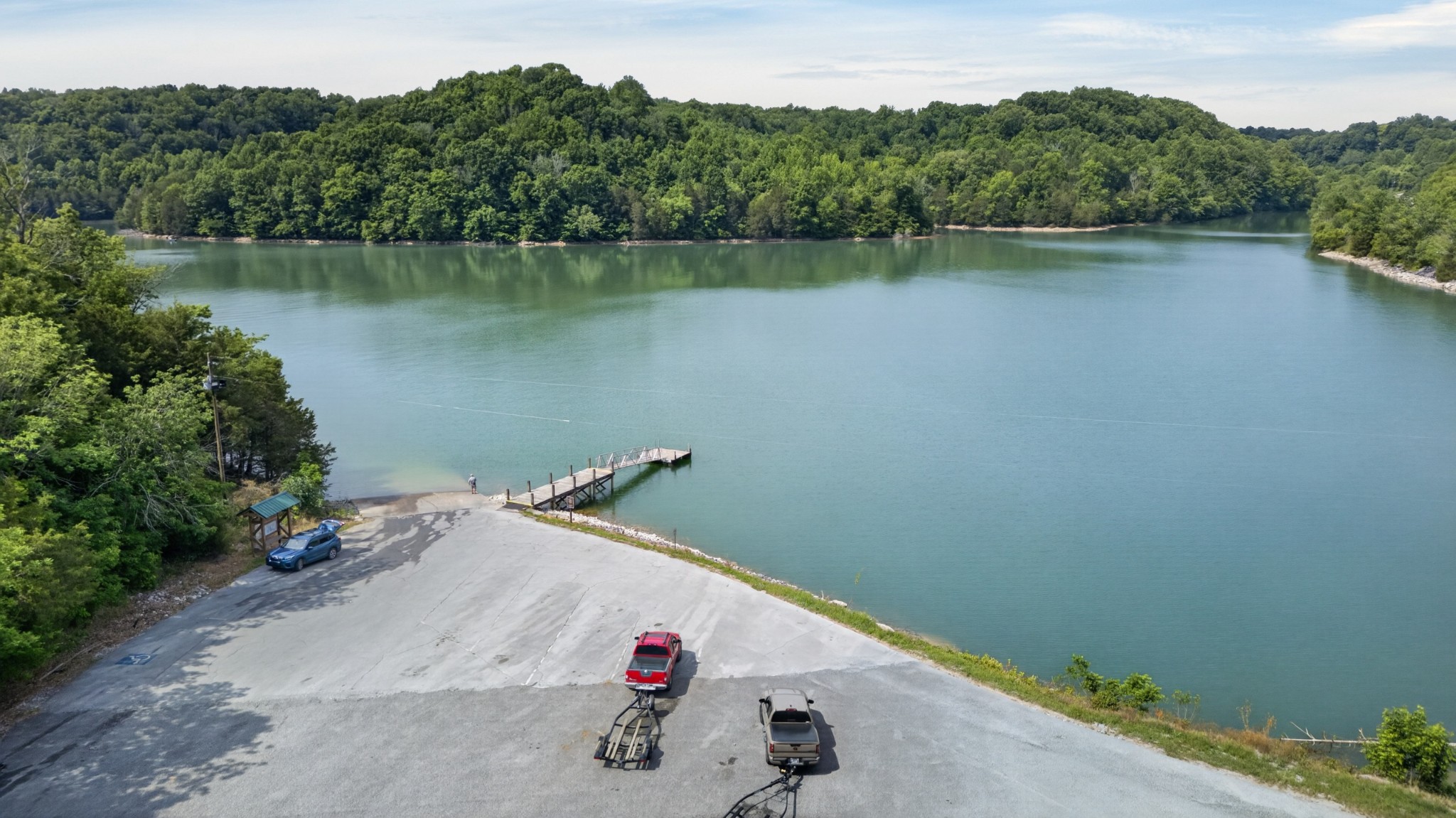 228 Shasteen Ridge Road Lynchburg, TN 37352 - Photo 51 of 53 a view of wooden floor and a lake