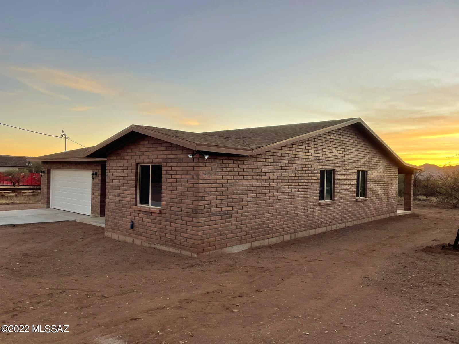 1850 Isabel Court Rio Rico, AZ 85648 - Photo 4 of 7 a house view with a backyard space