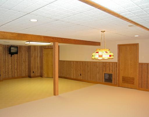 218 Pittsburgh Pike Ruffs Dale, PA 15679 - Photo 16 of 18 Den/Family/Great Room. The lower level game room features a full bath, an excerise room and plenty of storage areas.