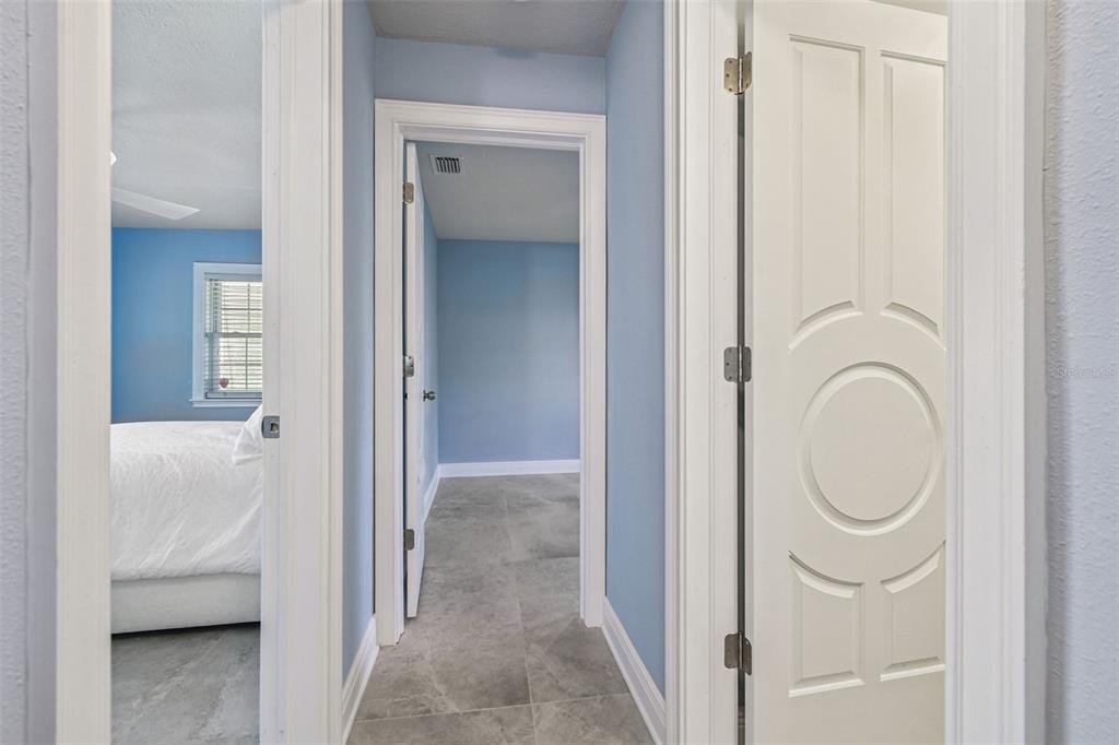 8025 Island Drive Port Richey, FL 34668 - Photo 19 of 67 a view of a bathroom from a hallway