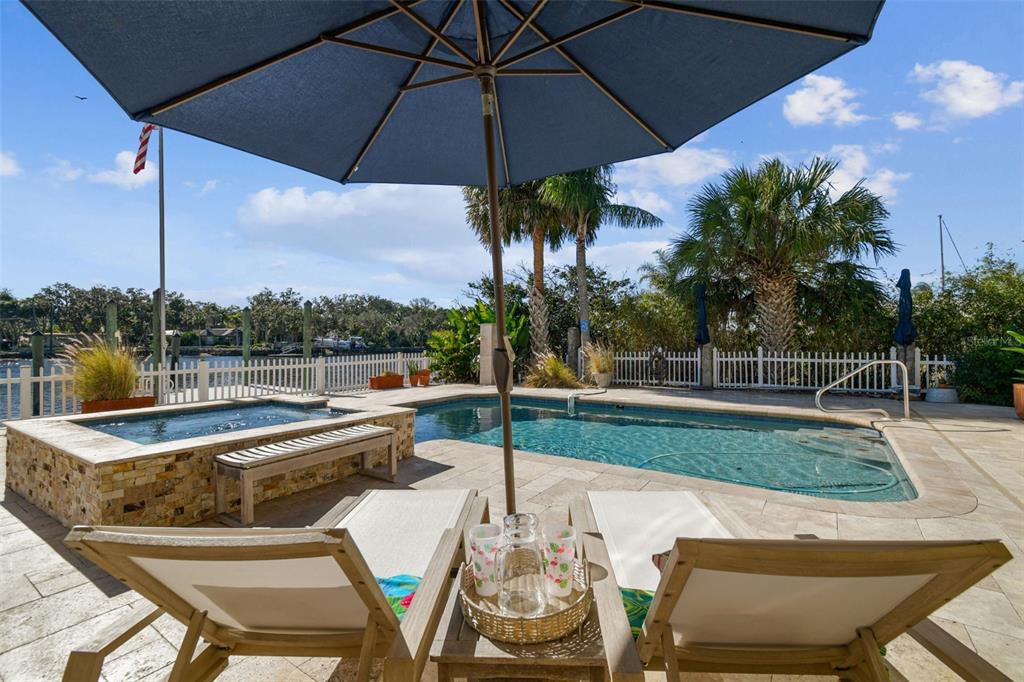 8025 Island Drive Port Richey, FL 34668 - Photo 4 of 67 a view of a chairs and table in the patio