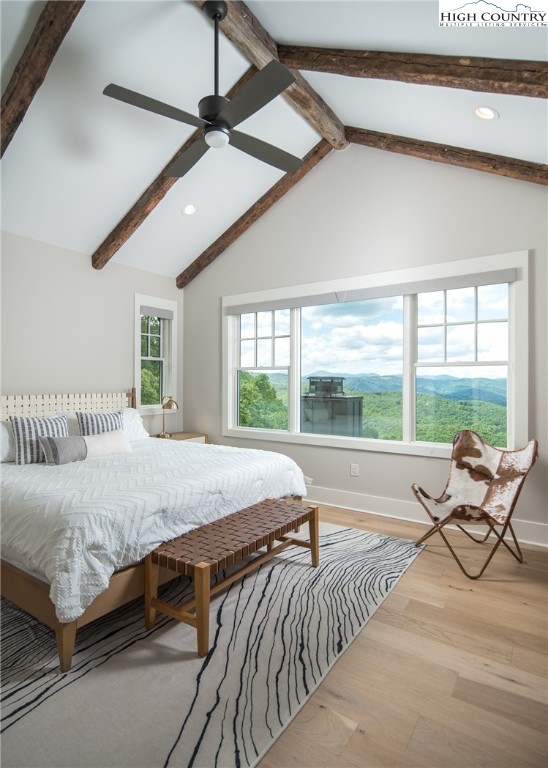 192 North Face Trail Boone, NC 28607 - Photo 17 of 38 a spacious bedroom with a bed and a large window