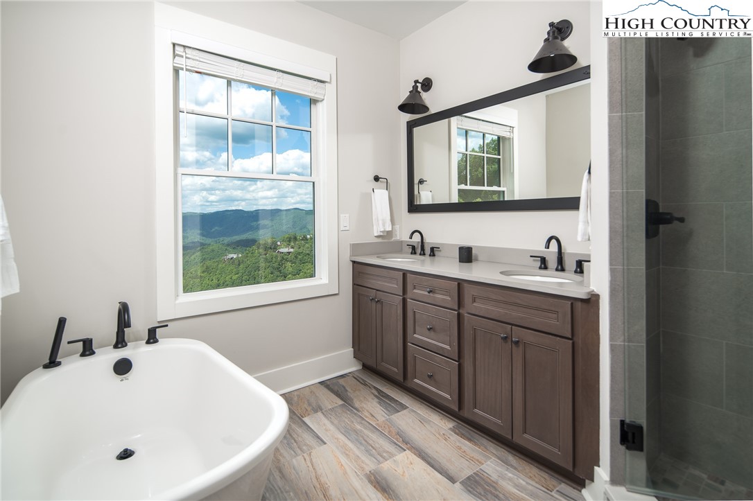 192 North Face Trail Boone, NC 28607 - Photo 18 of 38 a bathroom with a sink and a window