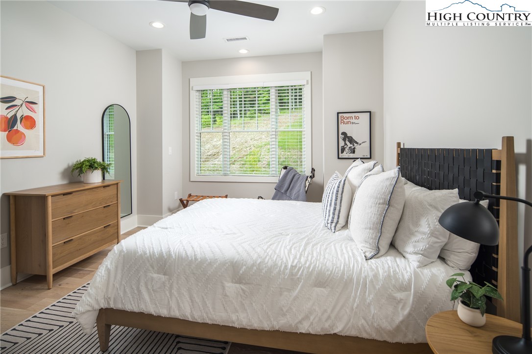 192 North Face Trail Boone, NC 28607 - Photo 21 of 38 a bedroom with a bed and a dresser