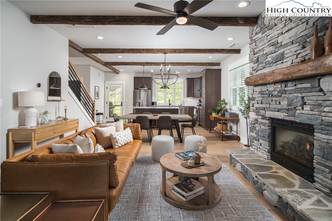 192 North Face Trail Boone, NC 28607 - Photo 3 of 38 a living room with furniture and a fireplace