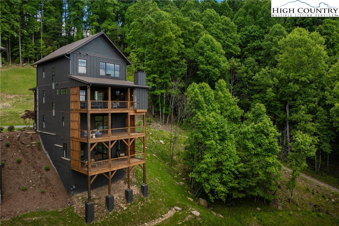 192 North Face Trail Boone, NC 28607 - Photo 36 of 38 a view of a house with yard and sitting area