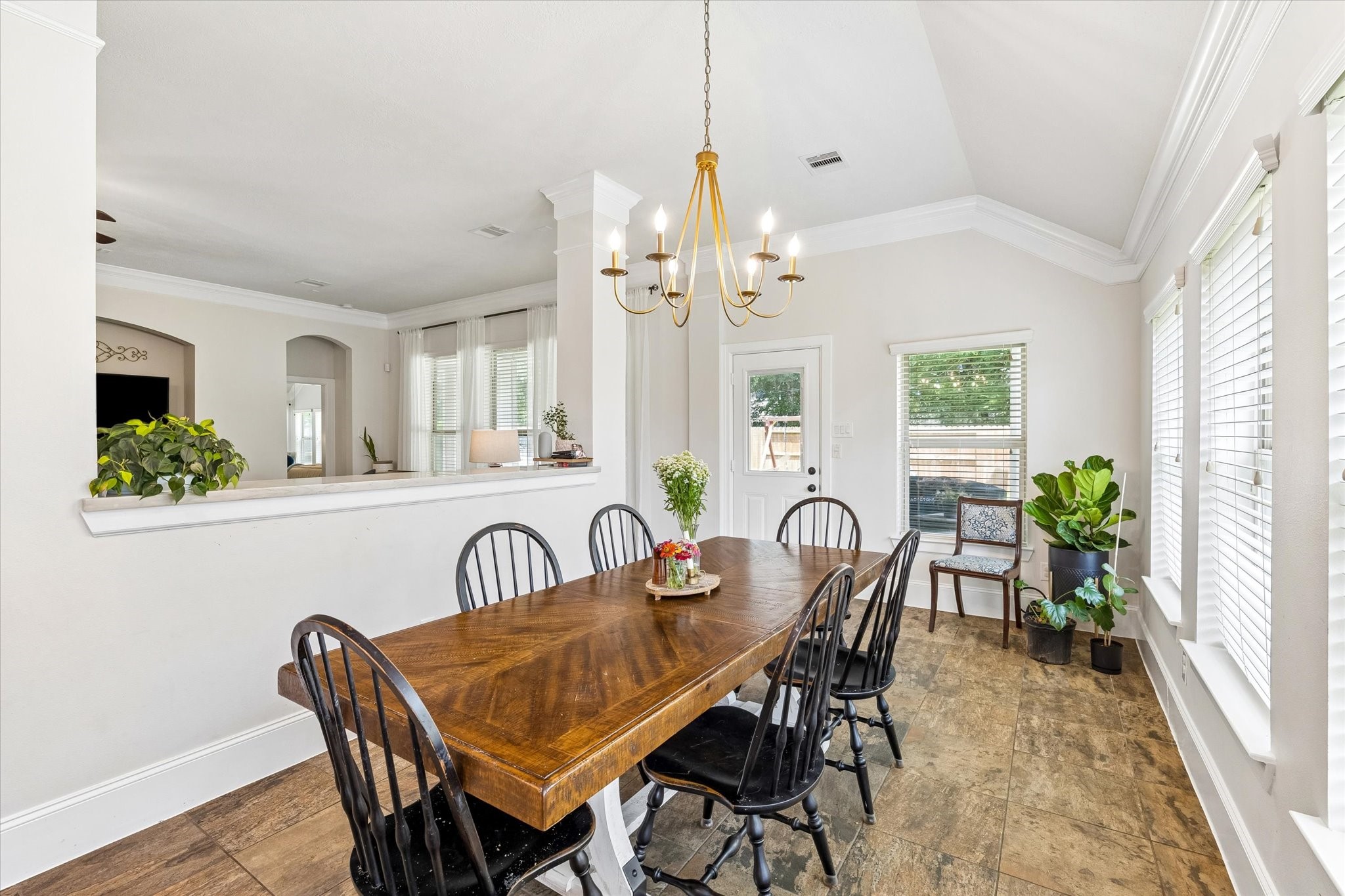 31306 Brighton Brook Lane Spring, TX 77386 - Photo 14 of 34 Generous dining area seamlessly connected to the kitchen and living spaces for effortless entertaining.