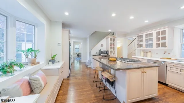a kitchen with a stove and cabinets