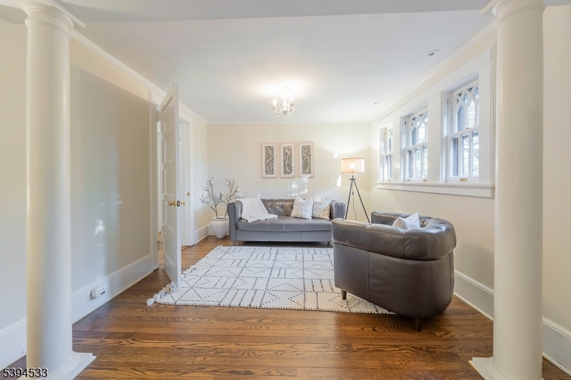 16 W Road Short Hills, NJ 07078 - Photo 25 of 47 a living room with furniture and a rug