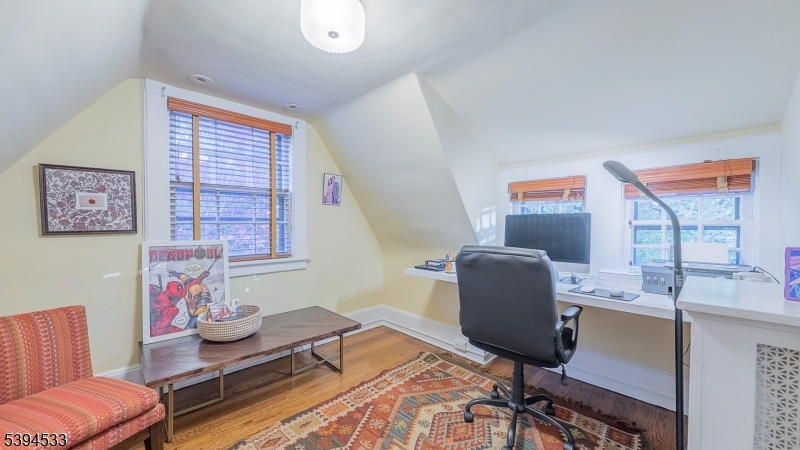 16 W Road Short Hills, NJ 07078 - Photo 30 of 47 a work room with furniture and a window