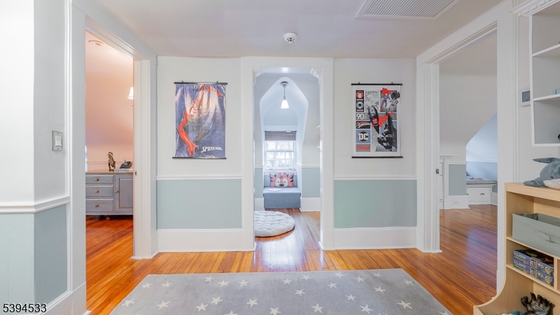 16 W Road Short Hills, NJ 07078 - Photo 33 of 47 a living room with furniture and a fireplace